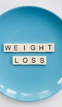 Ultimate Weight Loss Guide: Holistic Strategies to Achieve Your Goals Scrabble Pieces On A Plate